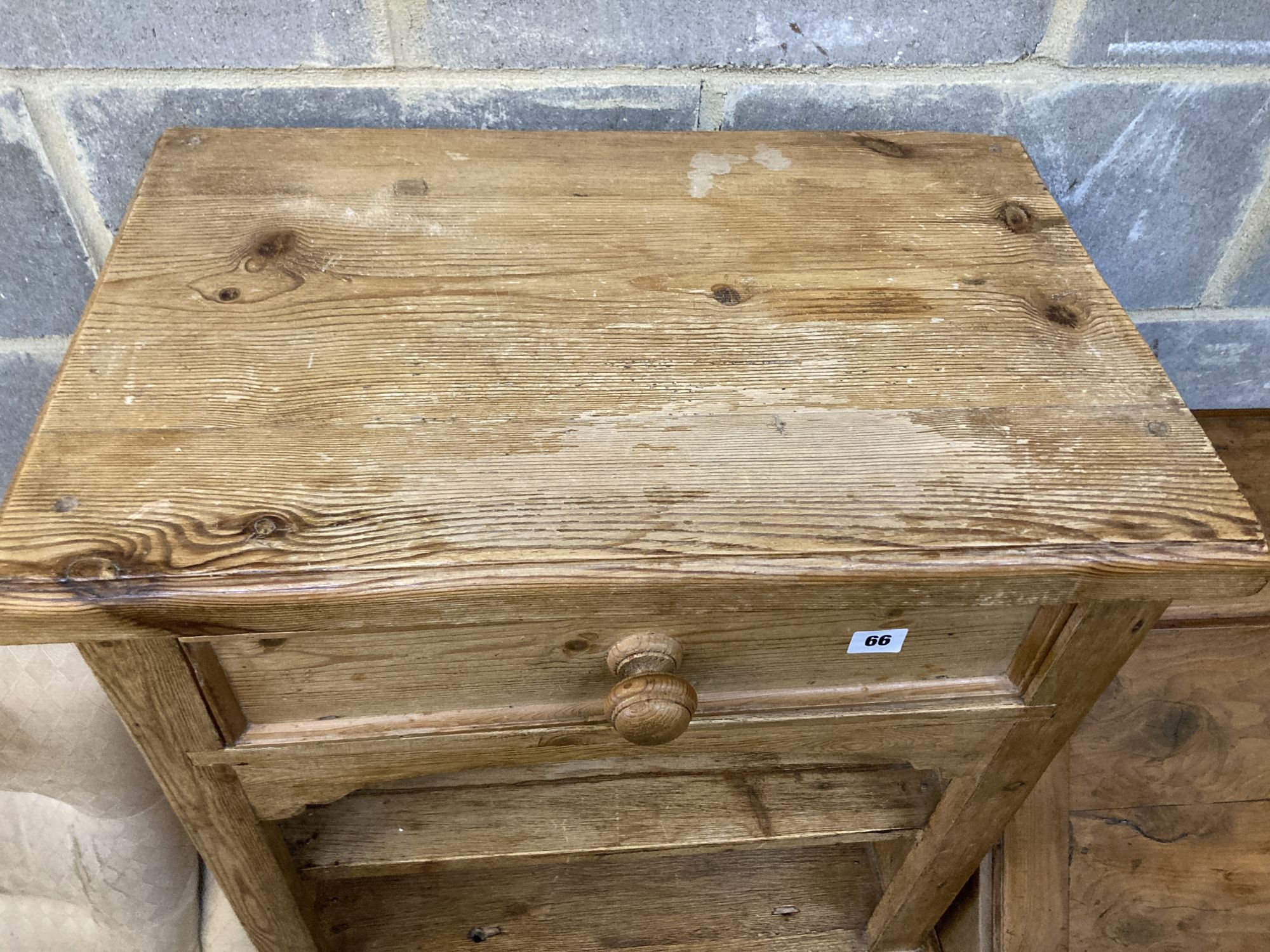 A pair of pine bedside cupboards, width 60cm, depth 38cm, height 67cm